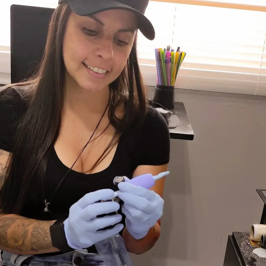 Foto da tatuadora Aline